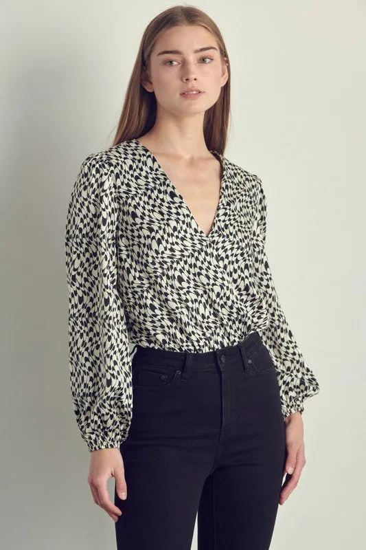 Long sleeve bodysuit top with abstract print