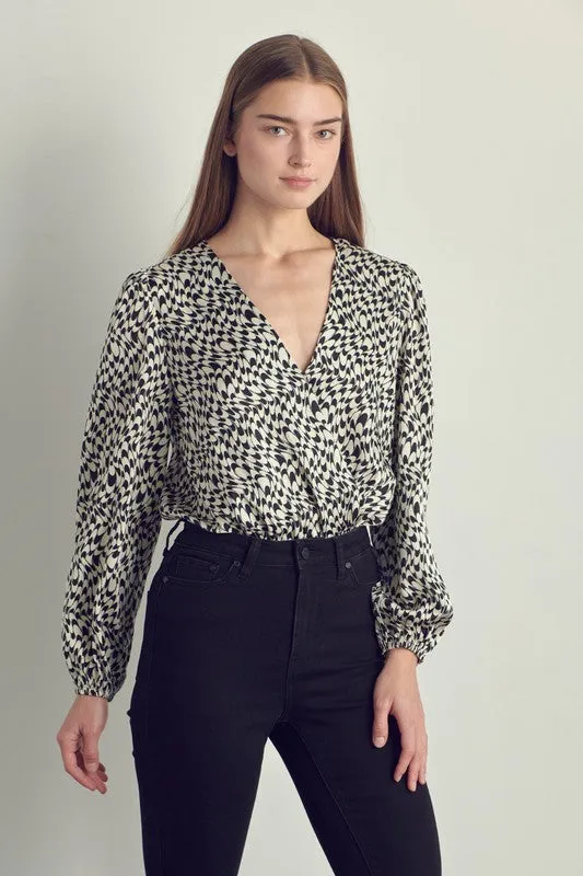Long sleeve bodysuit top with abstract print