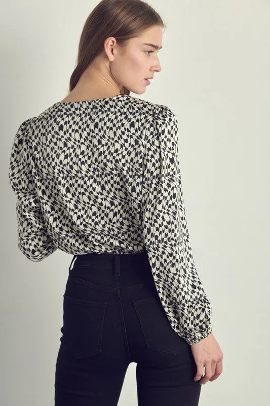 Long sleeve bodysuit top with abstract print