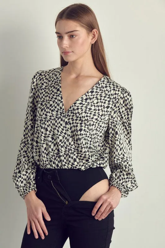 Long sleeve bodysuit top with abstract print
