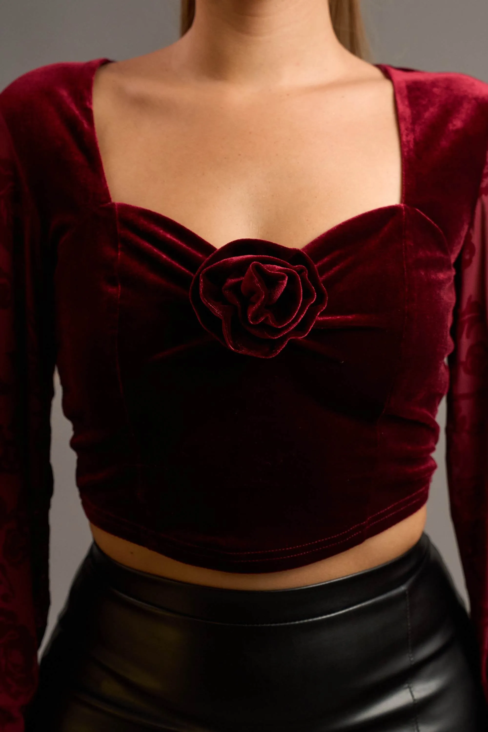 LUXE STRETCH VELVET ROSETTE CORSAGE PEASANT TOP